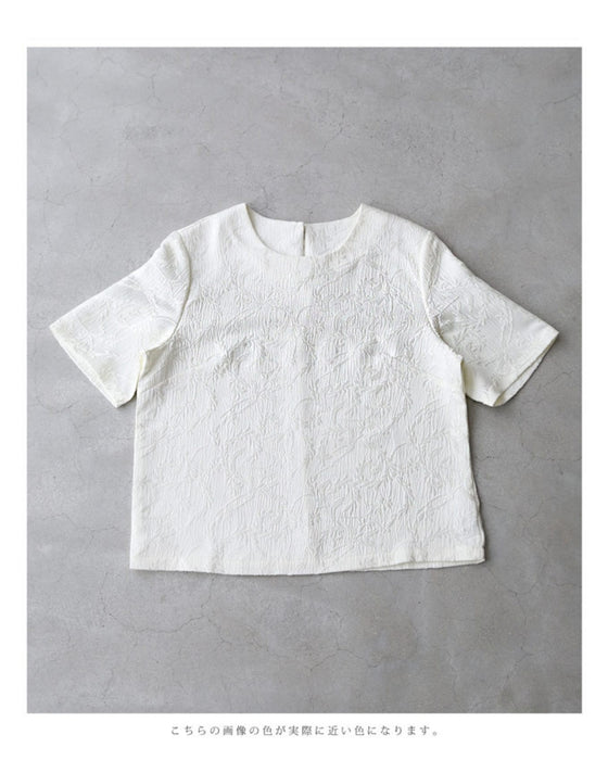 Pullover top with floating leaf pattern and relief effect