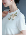 ビーズ煌めく立体花コサージュTシャツトップス