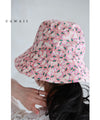 A gorgeous pink floral hat made of UV-cut material that can withstand the sun.