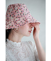 A gorgeous pink floral hat made of UV-cut material that can withstand the sun.
