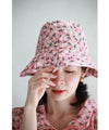 A gorgeous pink floral hat made of UV-cut material that can withstand the sun.