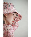 A gorgeous pink floral hat made of UV-cut material that can withstand the sun.