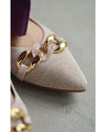 Tweed-style pumps decorated with chain parts