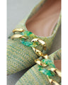 Tweed-style pumps decorated with chain parts