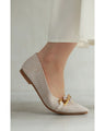 Tweed-style pumps decorated with chain parts