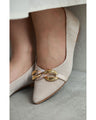 Tweed-style pumps decorated with chain parts