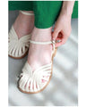 Strappy sandals with shell toe design