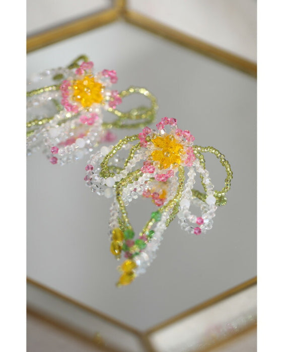 【 返品・交換不可 】光に煌めくお花のビーズリボンピアス