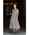 A mid-length dress with a voluminous skirt and waistline