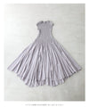 A mid-length dress with a voluminous skirt and waistline
