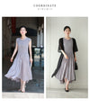 A mid-length dress with a voluminous skirt and waistline