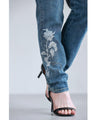 Denim pants with rhinestones and embroidered flowers