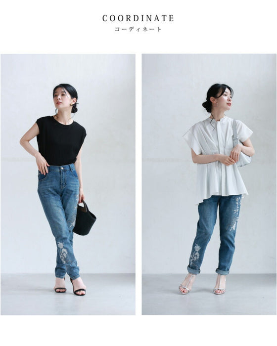 Denim pants with rhinestones and embroidered flowers