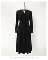 A medium-length velour-like dress with a pearl neck that wraps around you