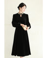 A medium-length velour-like dress with a pearl neck that wraps around you