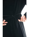 A medium-length velour-like dress with a pearl neck that wraps around you