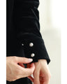 A medium-length velour-like dress with a pearl neck that wraps around you