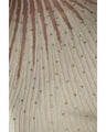 A streamlined ribbed cut-and-sew top with light particles falling on it
