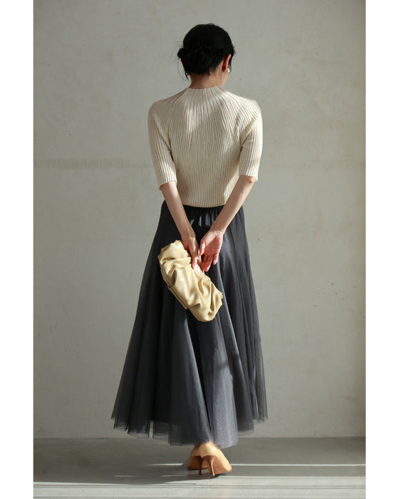 光の粒が降り注ぐ流線ラインリブカットソートップス