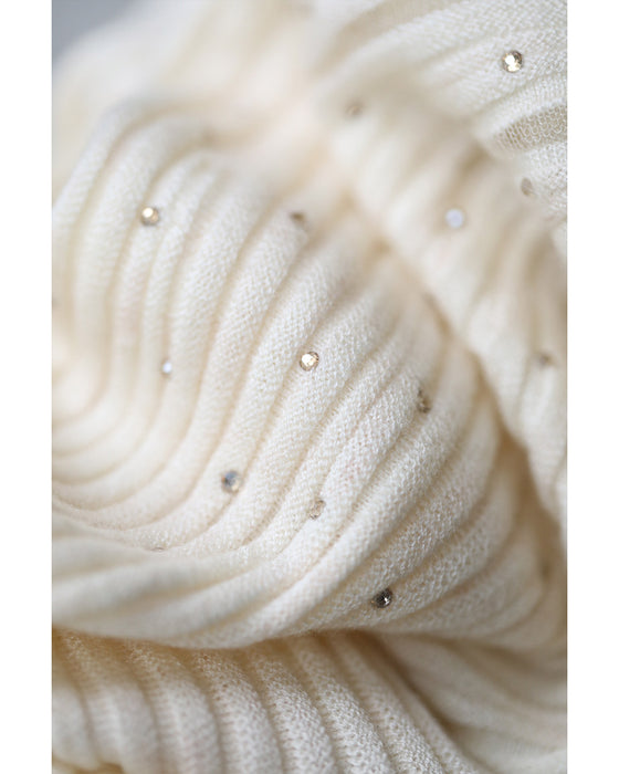 光の粒が降り注ぐ流線ラインリブカットソートップス