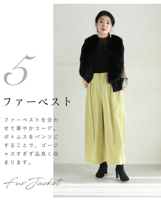 光の粒が降り注ぐ流線ラインリブカットソートップス