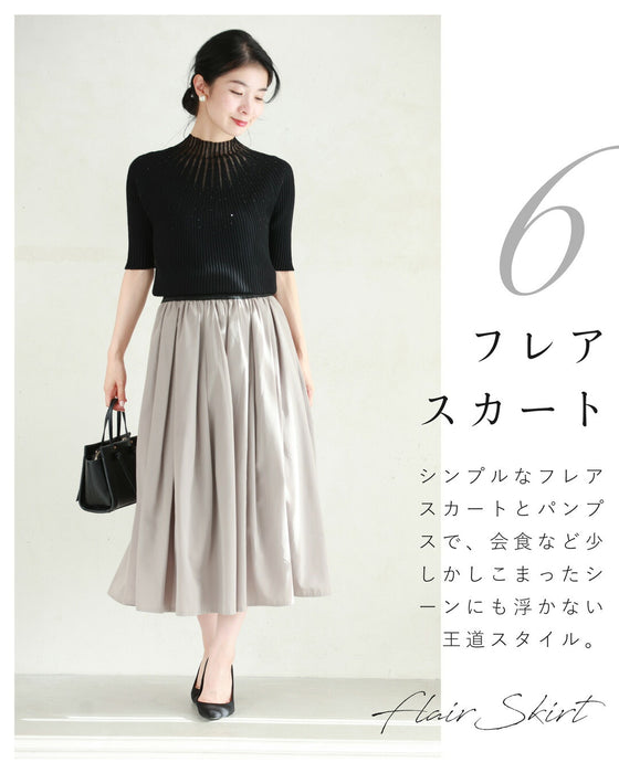 光の粒が降り注ぐ流線ラインリブカットソートップス