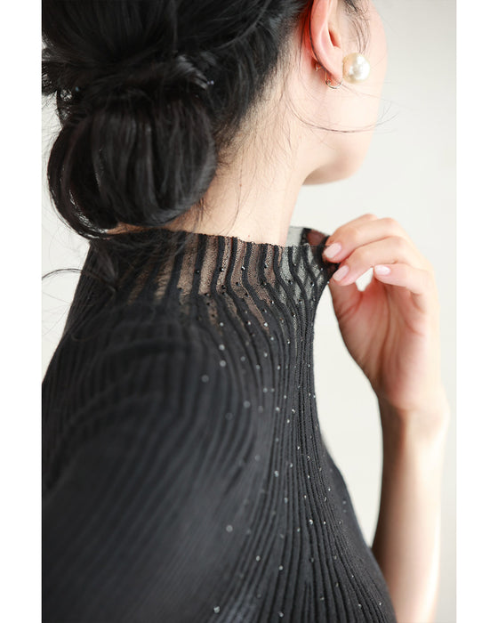 光の粒が降り注ぐ流線ラインリブカットソートップス