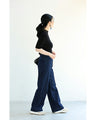A streamlined ribbed cut-and-sew top with light particles falling on it