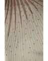 A streamlined ribbed cut-and-sew top with light particles falling on it