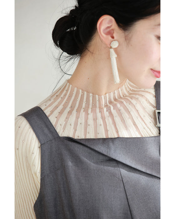 光の粒が降り注ぐ流線ラインリブカットソートップス