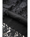 A long dress with lace that spreads out at the feet