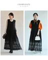 A long dress with lace that spreads out at the feet