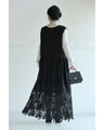 A long dress with lace that spreads out at the feet