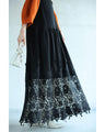 A long dress with lace that spreads out at the feet