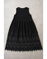 A long dress with lace that spreads out at the feet