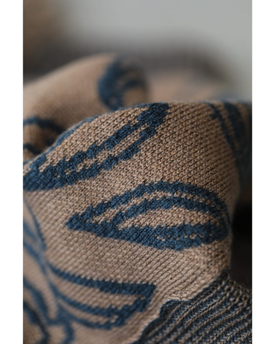 青い花が連なるウエストリブニットミディアムスカート