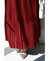 Grape-colored shiny pleated midi skirt