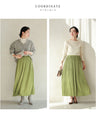 Grape-colored shiny pleated midi skirt