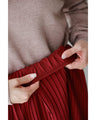 Grape-colored shiny pleated midi skirt