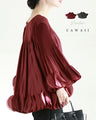 Flared blouse top with fluttery circle frills