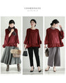 Flared blouse top with fluttery circle frills