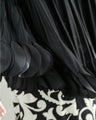 Flared blouse top with fluttery circle frills