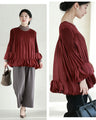 Flared blouse top with fluttery circle frills