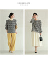 A floral embroidered pullover top with sparkling fine sequins