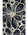 A floral embroidered pullover top with sparkling fine sequins