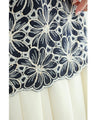 A floral embroidered pullover top with sparkling fine sequins
