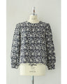 A floral embroidered pullover top with sparkling fine sequins