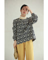 A floral embroidered pullover top with sparkling fine sequins