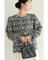 A floral embroidered pullover top with sparkling fine sequins