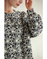 A floral embroidered pullover top with sparkling fine sequins